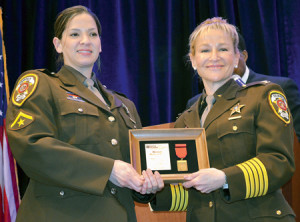 Fairfax Master Deputy Sheriff Heather Lama received a Bronze Medal of Valor from Sheriff Stacey Kincaid.